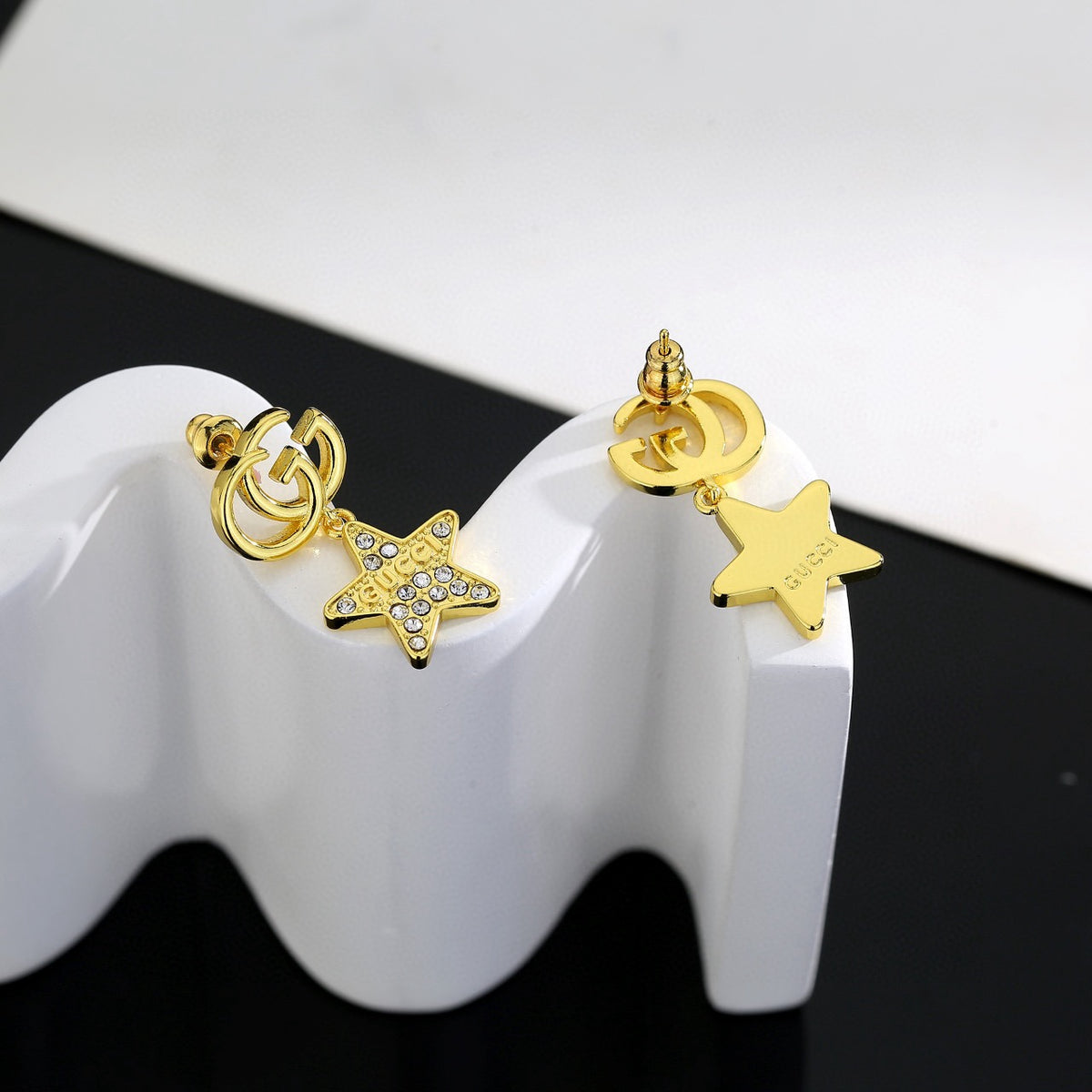 Gucci Gold-Tone GG and Star Drop Earrings - album image 8