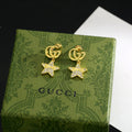 Gucci Gold-Tone GG and Star Drop Earrings - album image 1