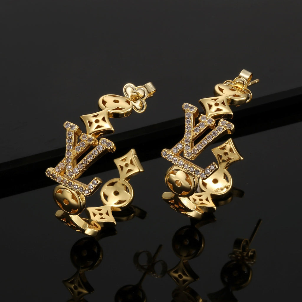 Louis Vuitton Gold-Tone Geometric Drop Earrings with Hanging Charms - album image 1