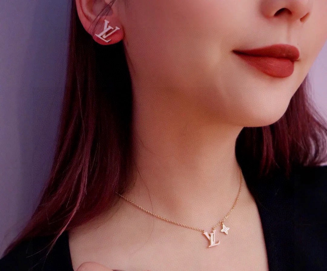 Louis Vuitton LV Letter Stud Earrings - album image 2