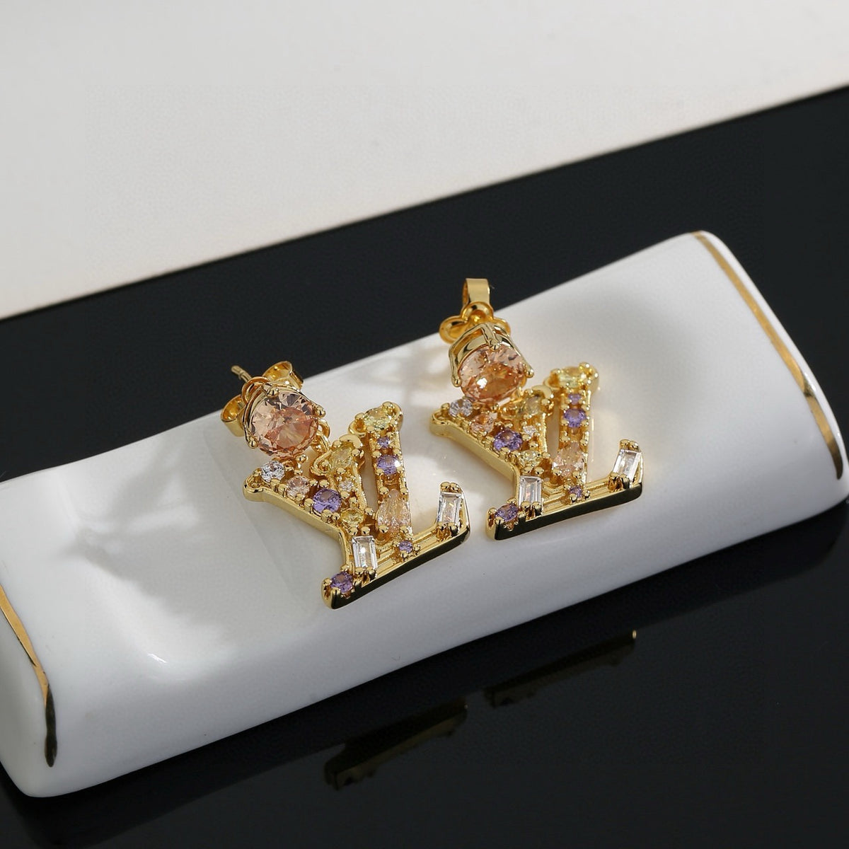 Louis Vuitton LV Letter Stud Earrings - album image 4