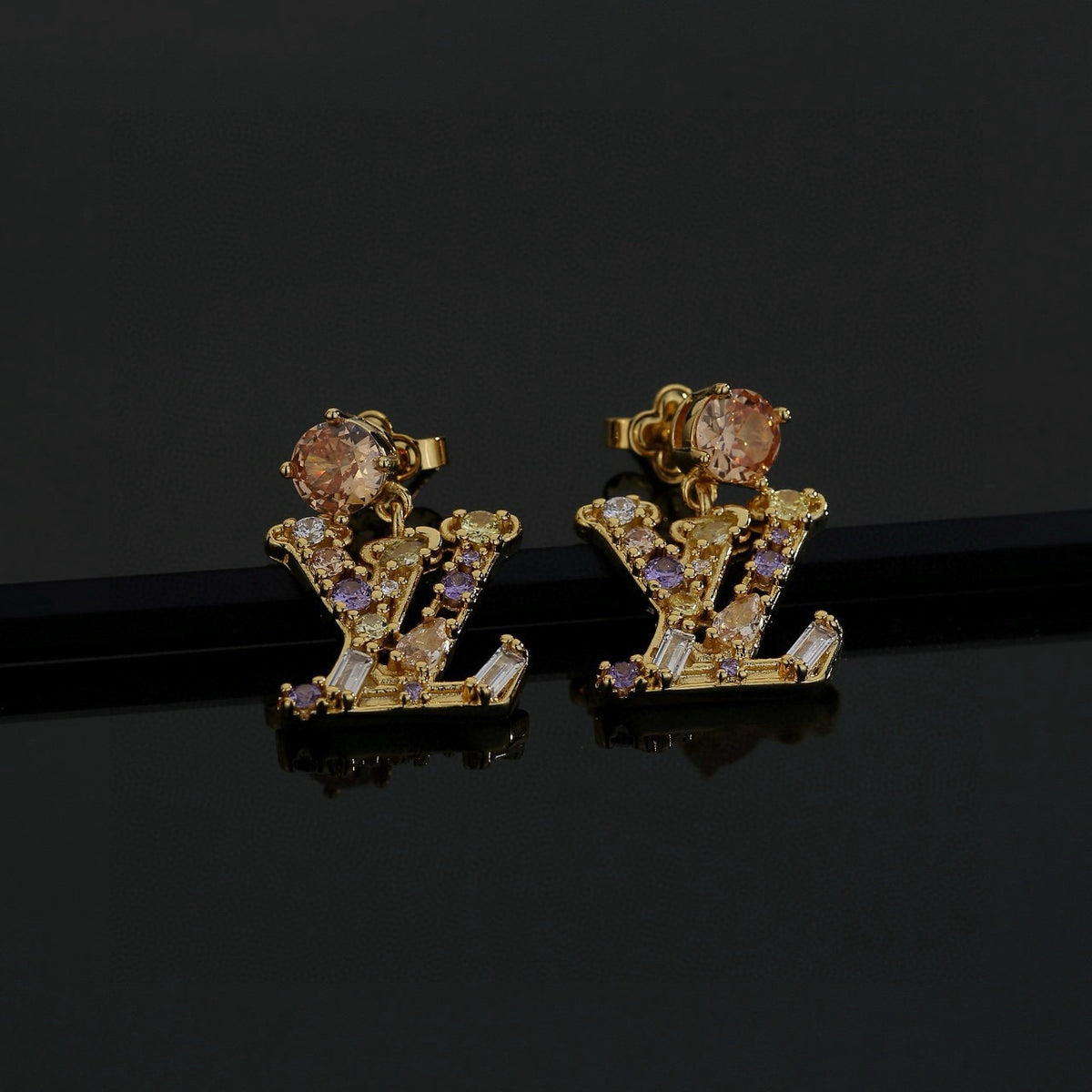 Louis Vuitton LV Letter Stud Earrings - album image 3