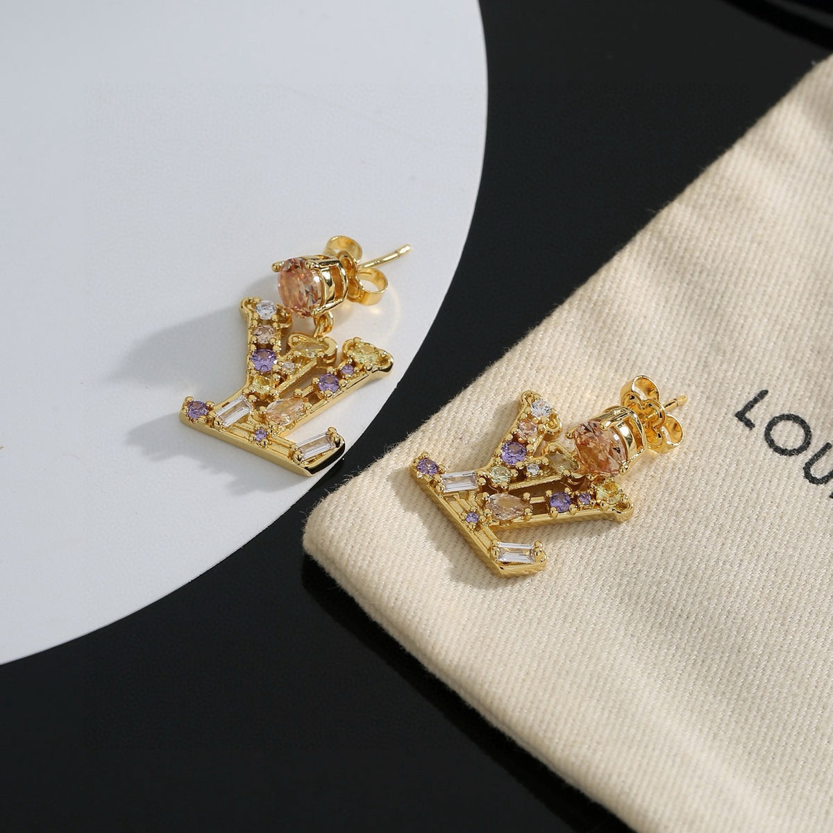 Louis Vuitton LV Letter Stud Earrings - album image 1