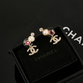 Chanel Interlocking C Gold-Tone Multicolor Star Stud Earrings - album image 1