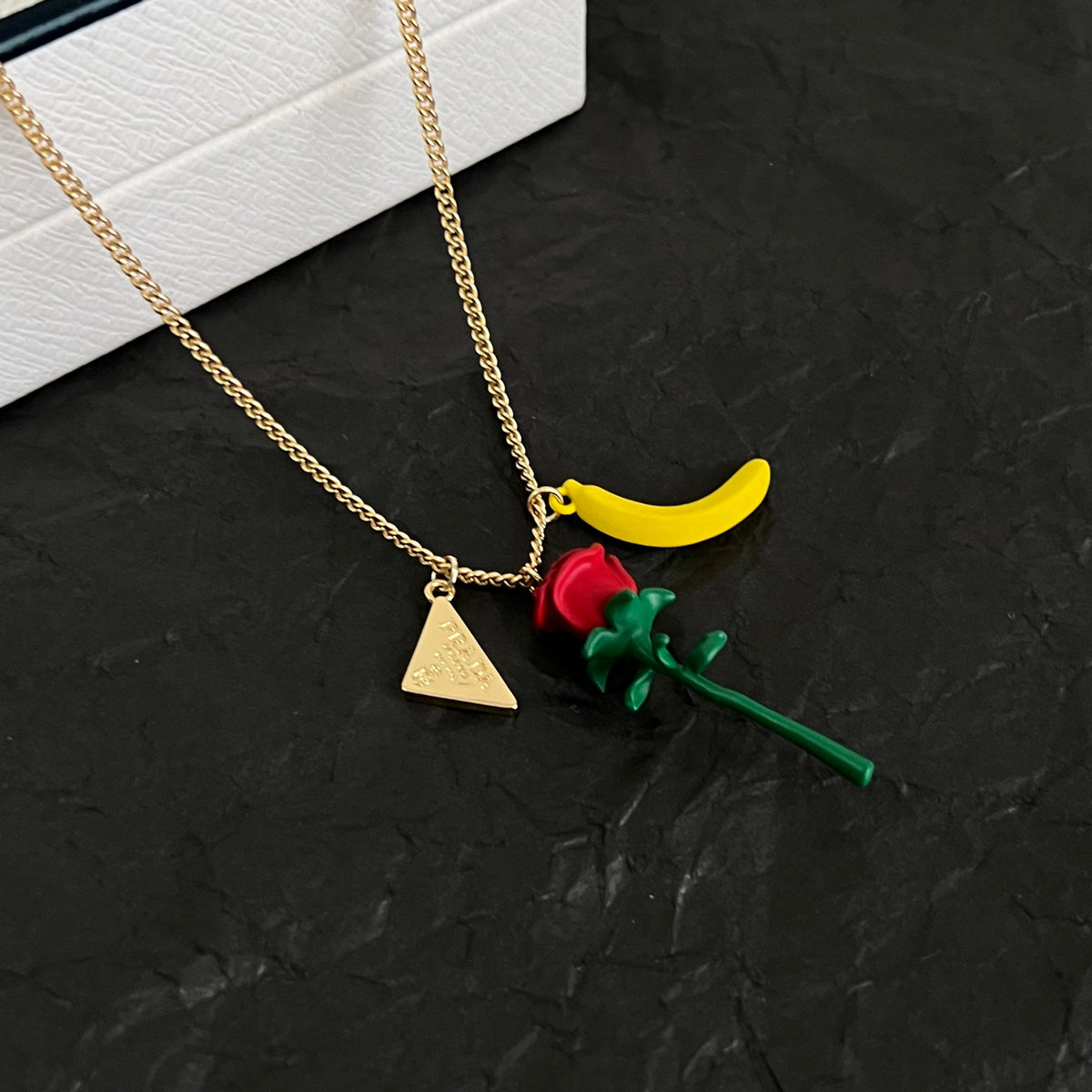 Prada Gold-Tone Rose and Triangle Charm Necklace - album image 3