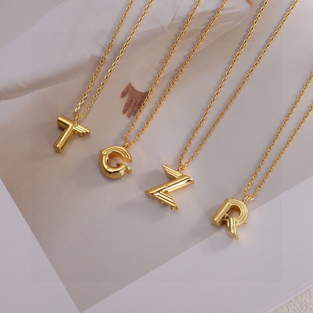 Louis Vuitton Gold-Tone Flower and Oval Charm Necklace - album image 3