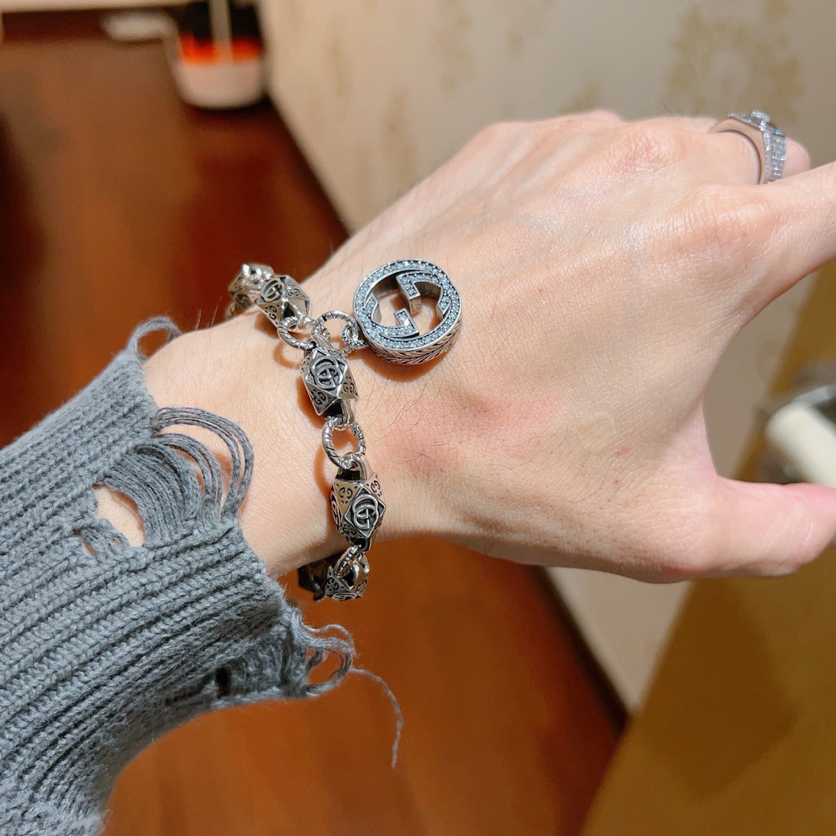Gucci Silver-Tone GG Medallion Bracelet with G Charm - album image 7
