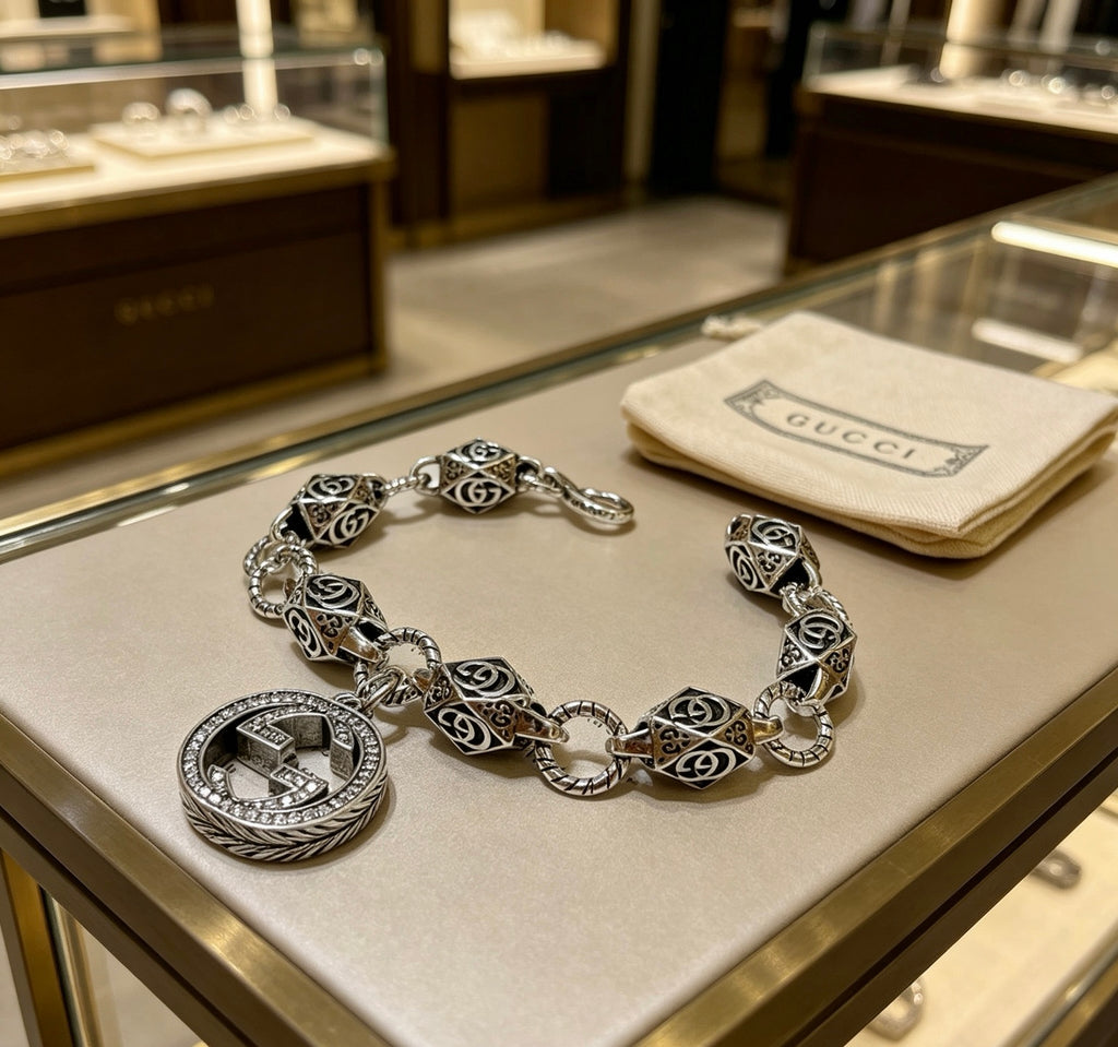 Gucci Silver-Tone GG Medallion Bracelet with G Charm - album image 5