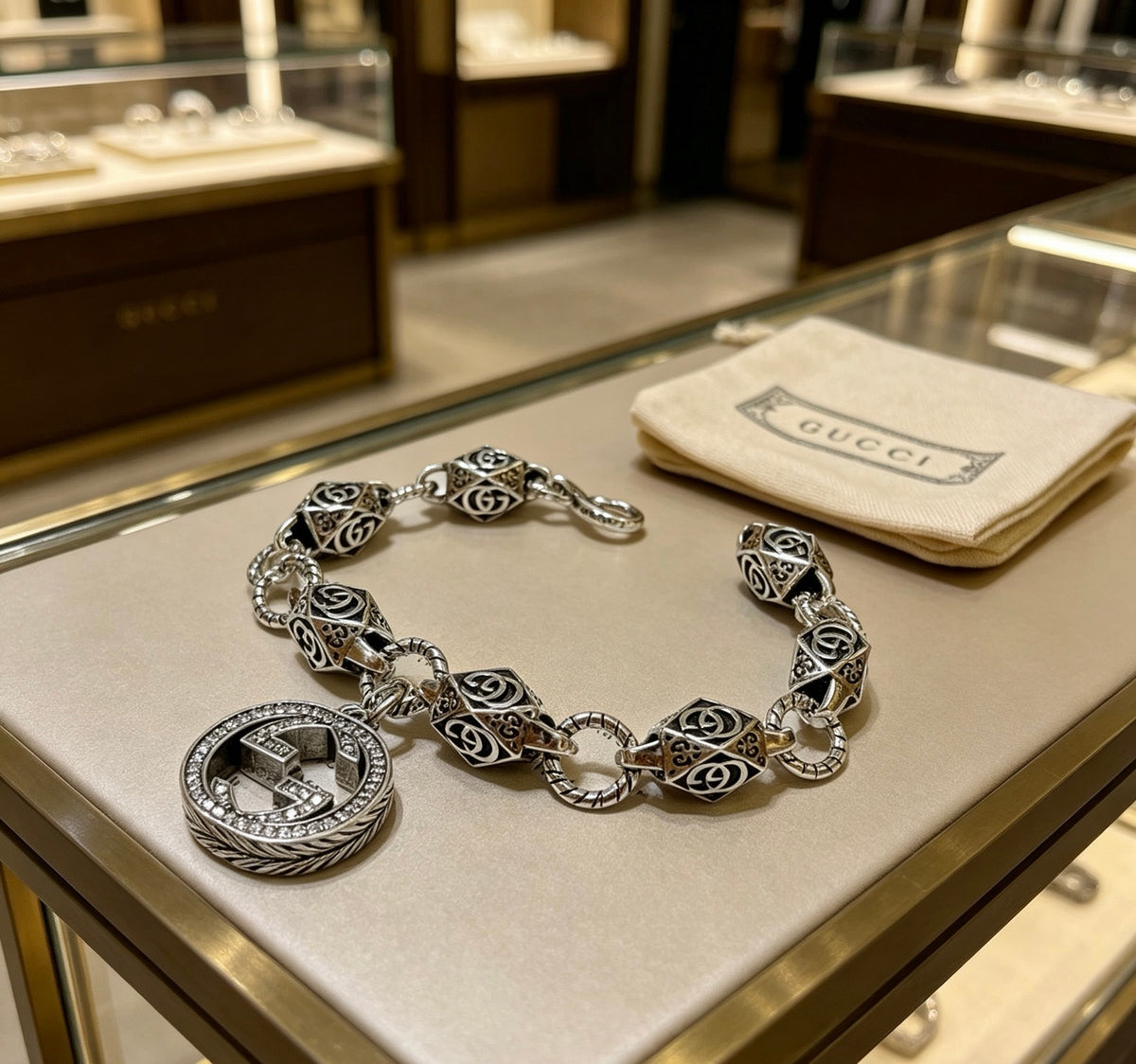 Gucci Silver-Tone GG Medallion Bracelet with G Charm - album image 5