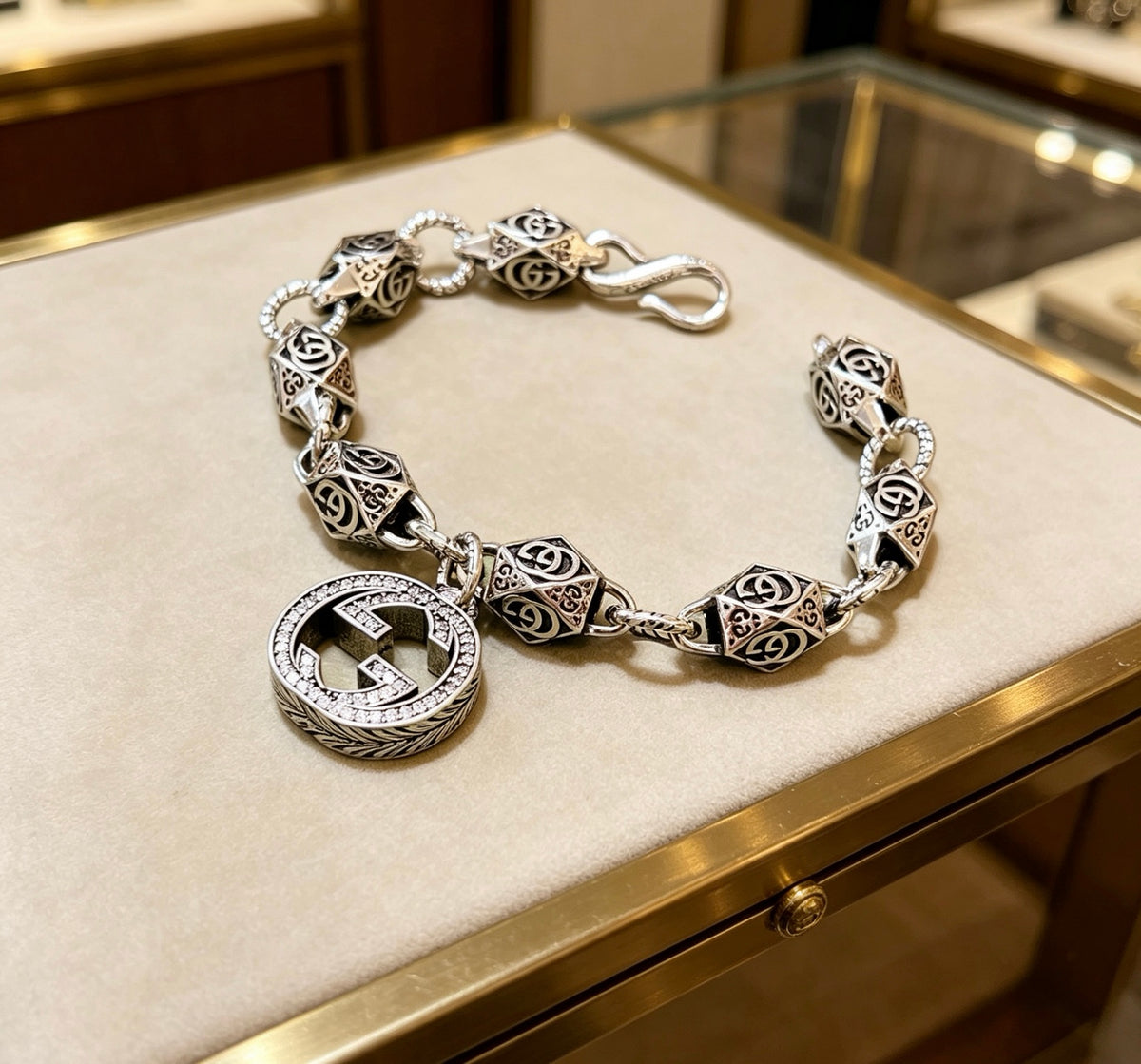 Gucci Silver-Tone GG Medallion Bracelet with G Charm - album image 2