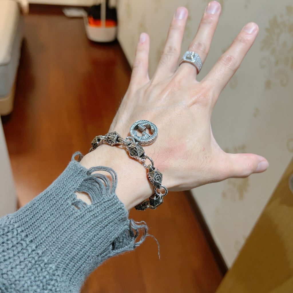 Gucci Silver-Tone GG Medallion Bracelet with G Charm - album image 3