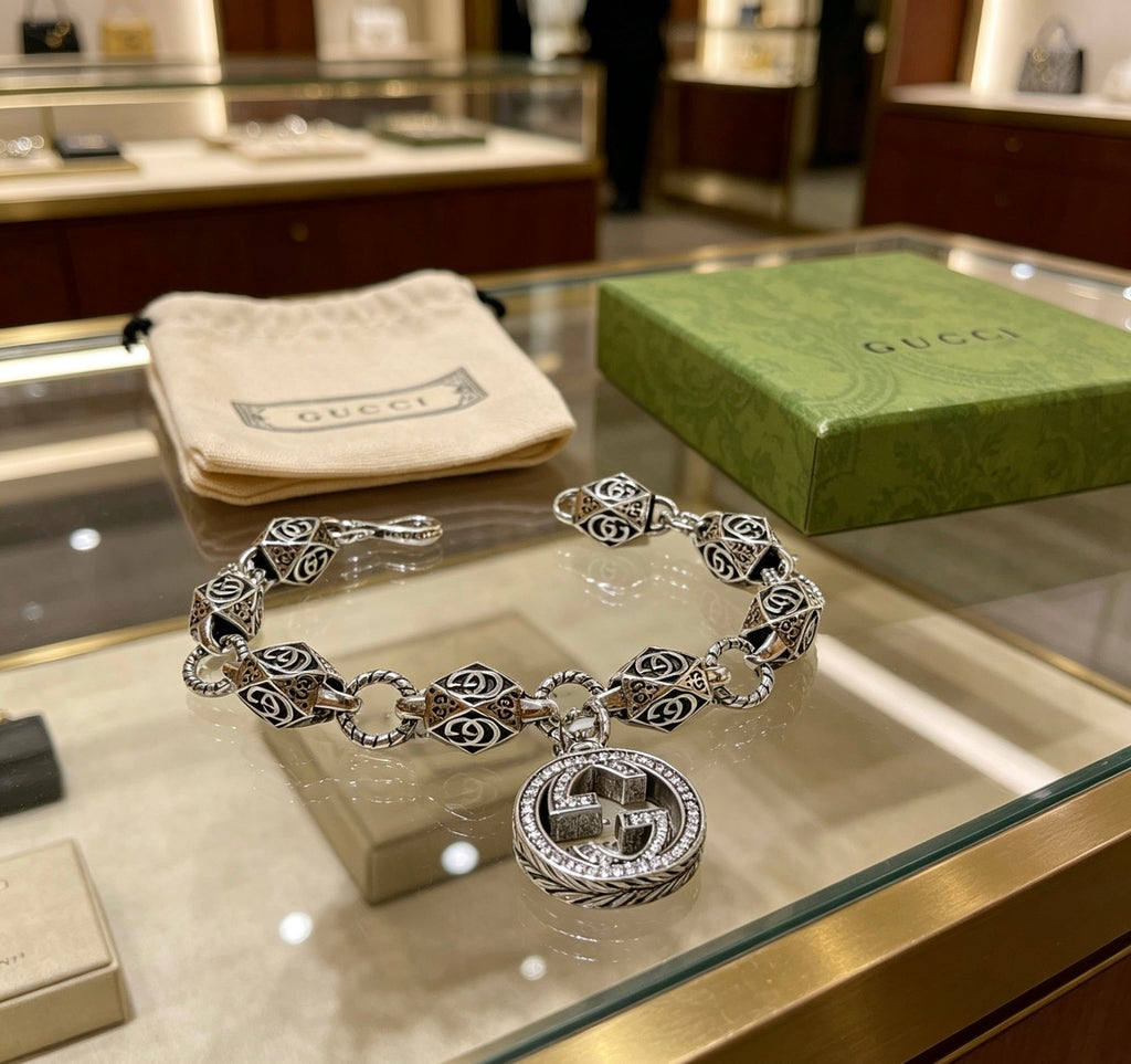 Gucci Silver-Tone GG Medallion Bracelet with G Charm - album image 9