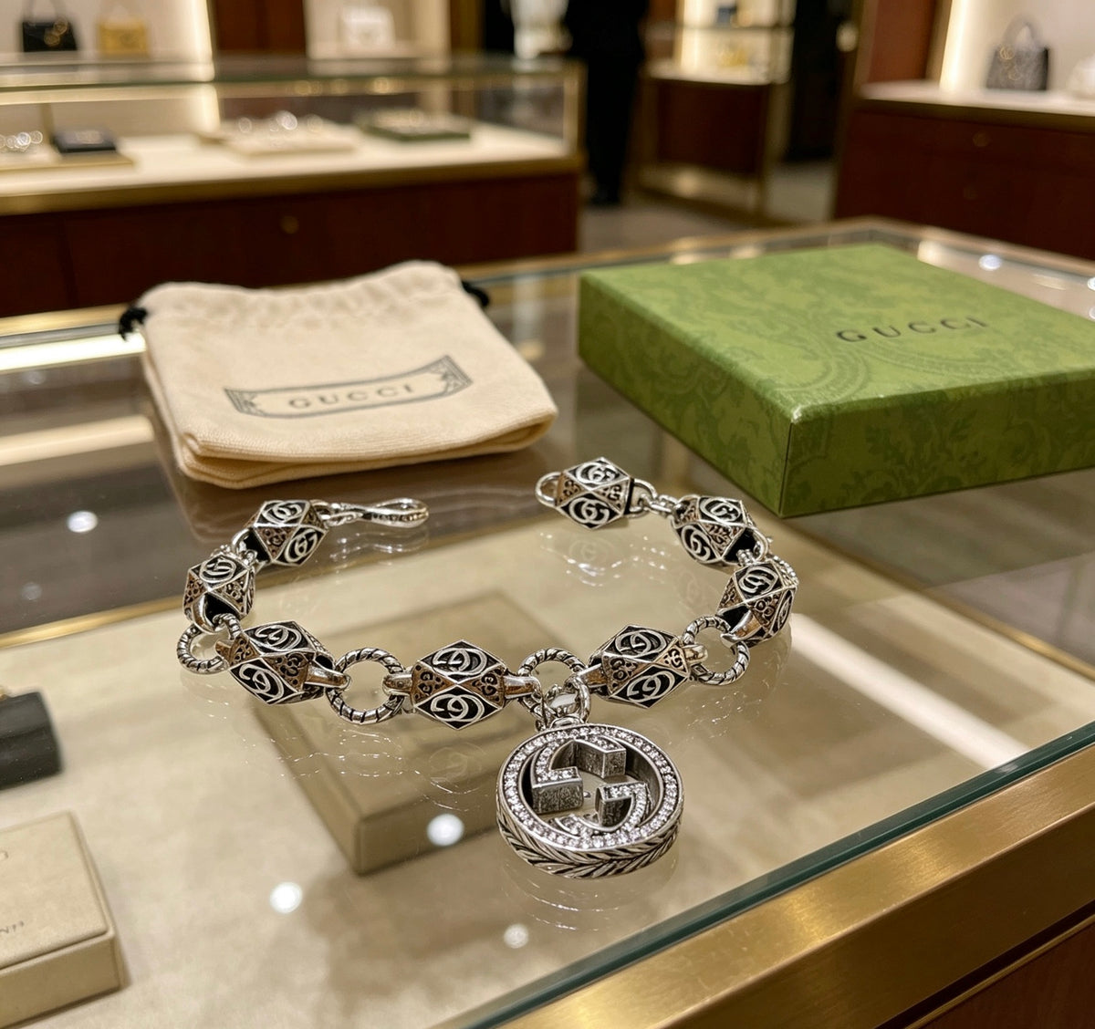 Gucci Silver-Tone GG Medallion Bracelet with G Charm - album image 9