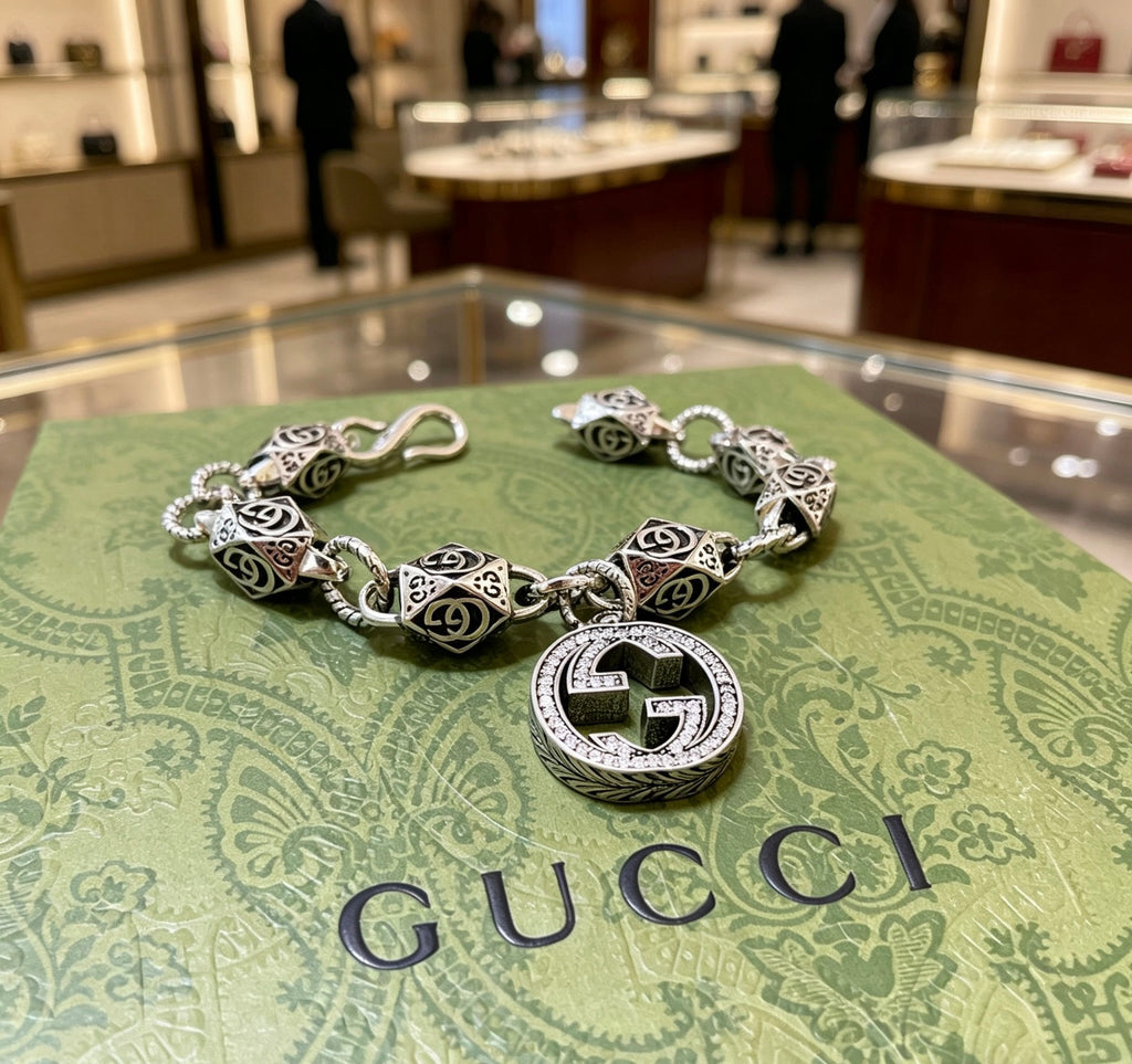 Gucci Silver-Tone GG Medallion Bracelet with G Charm - album image 4