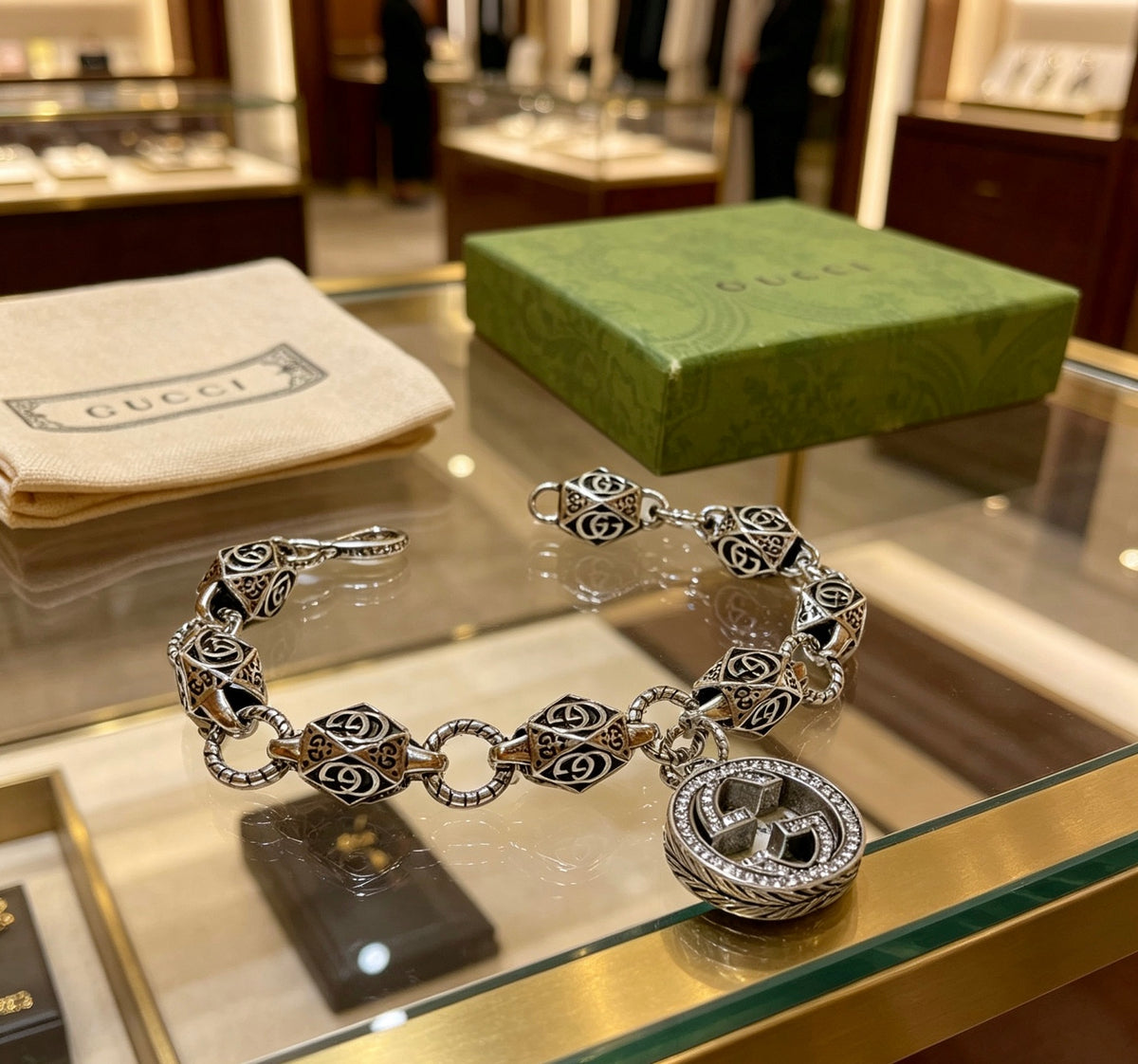Gucci Silver-Tone GG Medallion Bracelet with G Charm - album image 8