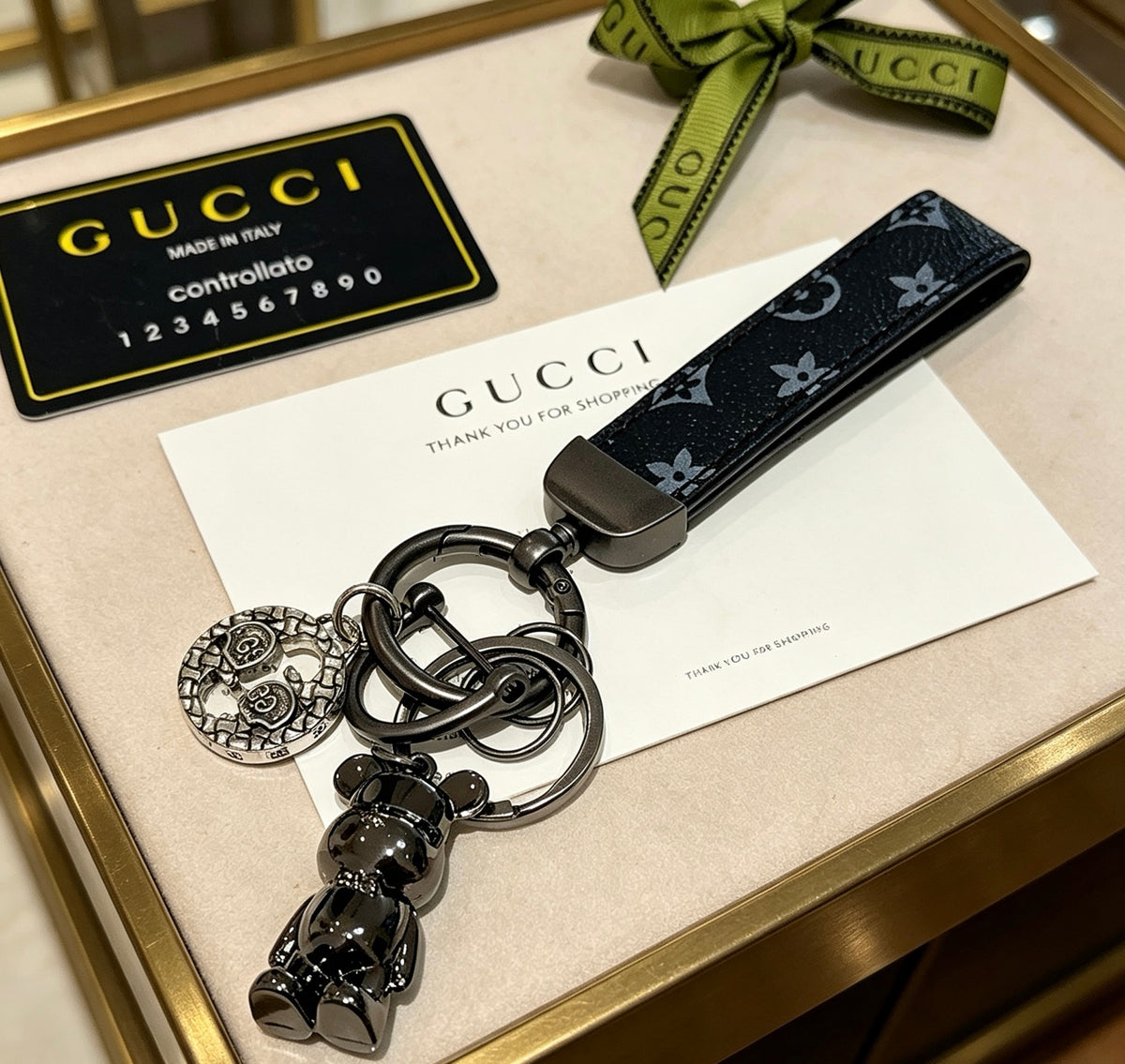 Gucci Anger Forest Interlocking G Key Keychain - album image 1