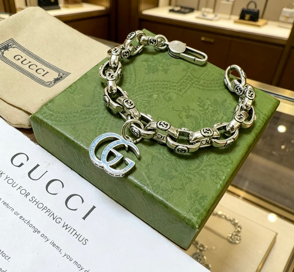 Gucci Silver-Tone Textured Link Bracelet with G Charm - album image 4