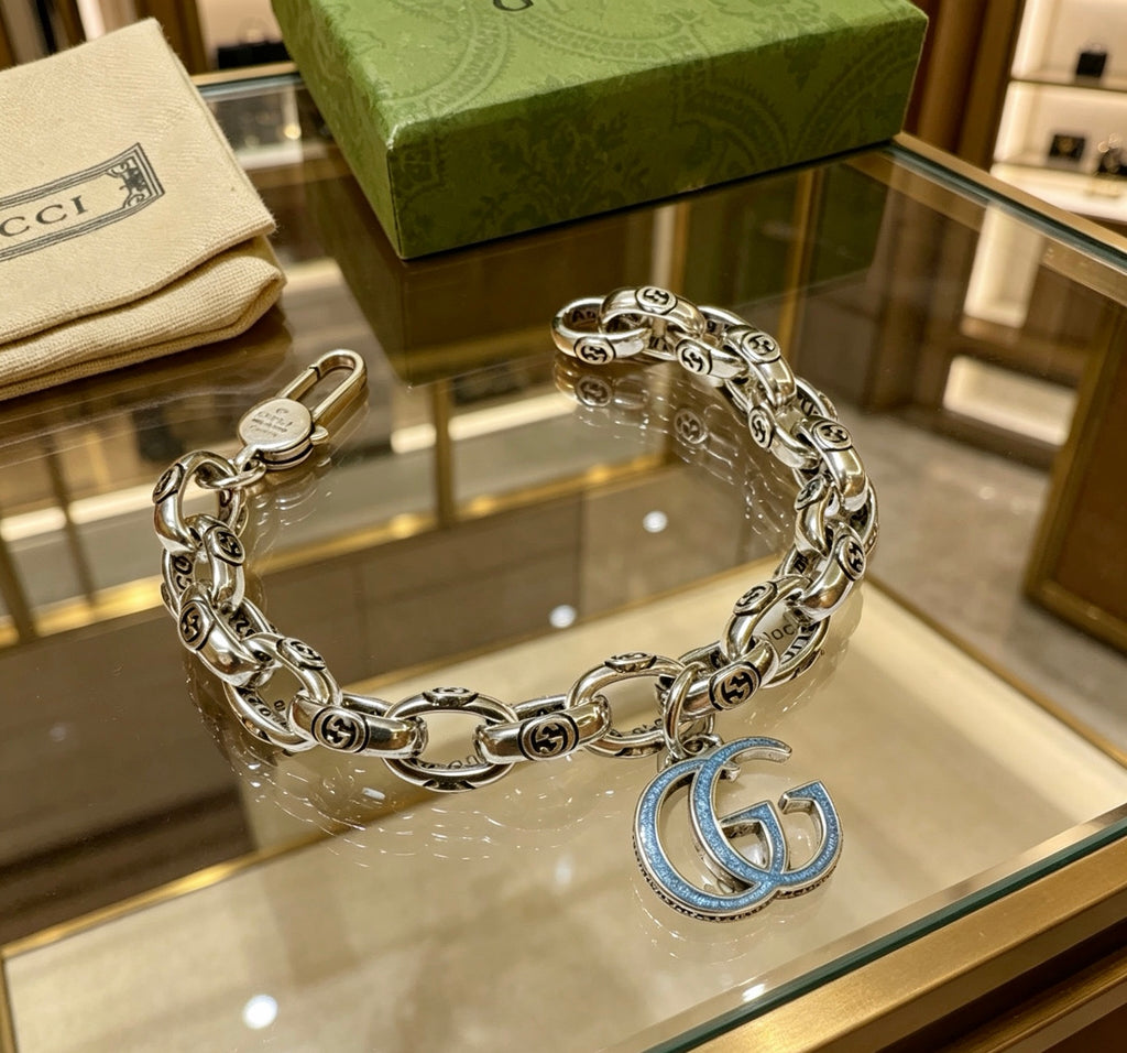 Gucci Silver-Tone Textured Link Bracelet with G Charm - album image 7