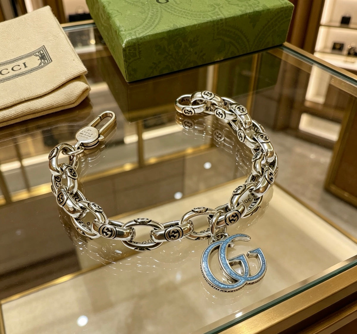 Gucci Silver-Tone Textured Link Bracelet with G Charm - album image 7
