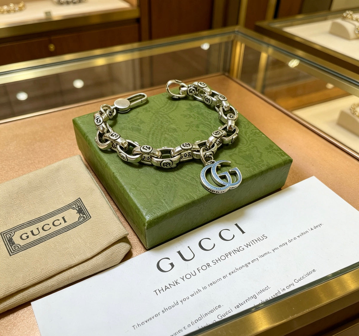 Gucci Silver-Tone Textured Link Bracelet with G Charm - album image 8
