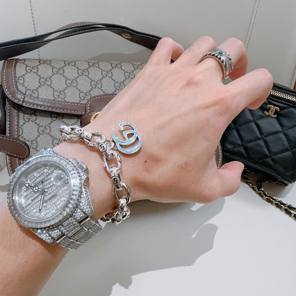Gucci Silver-Tone Textured Link Bracelet with G Charm - album image 9