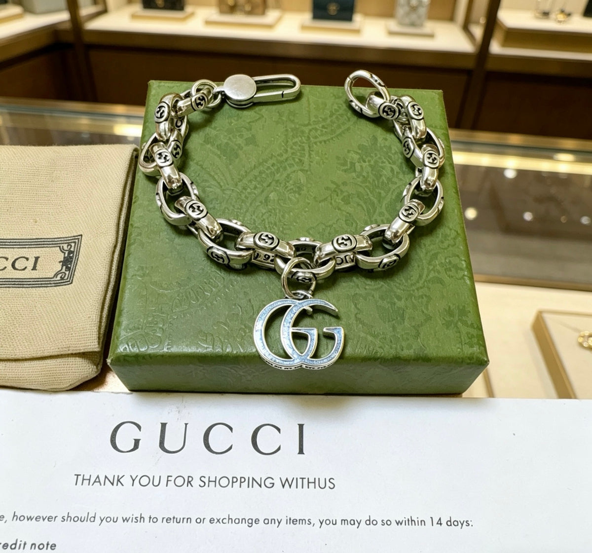 Gucci Silver-Tone Textured Link Bracelet with G Charm - album image 2