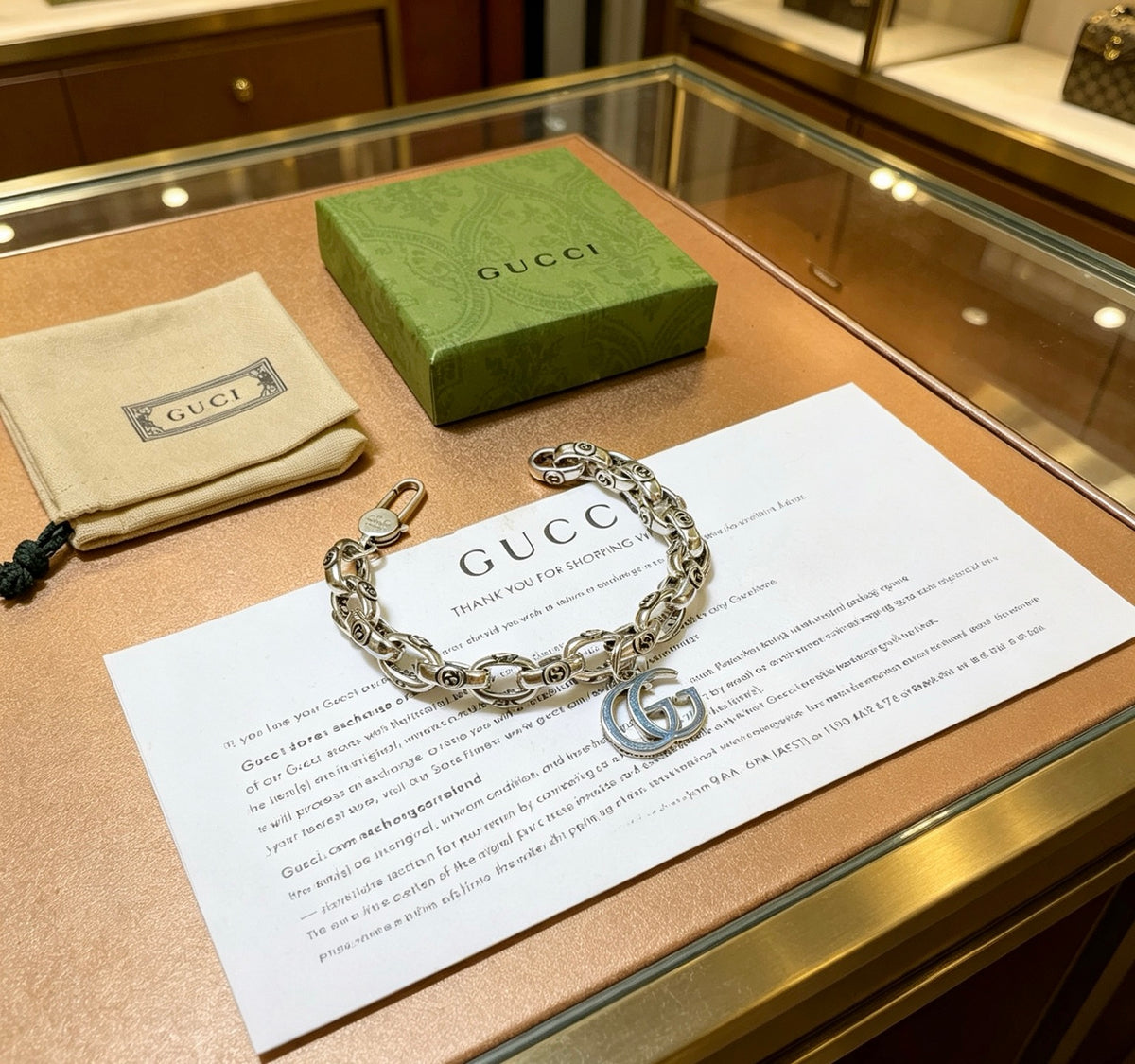 Gucci Silver-Tone Textured Link Bracelet with G Charm - album image 5