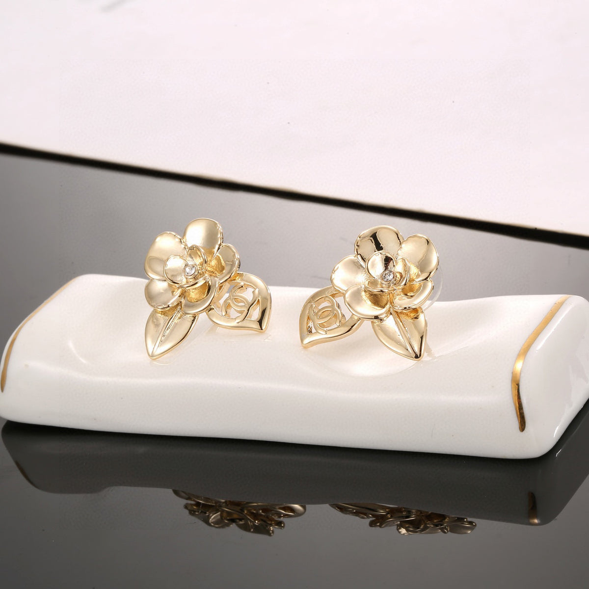 Chanel Interlocking C Camellia Resin Gold-Tone Stud Earrings - album image 4
