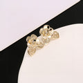 Chanel Interlocking C Camellia Resin Gold-Tone Stud Earrings - album image 1