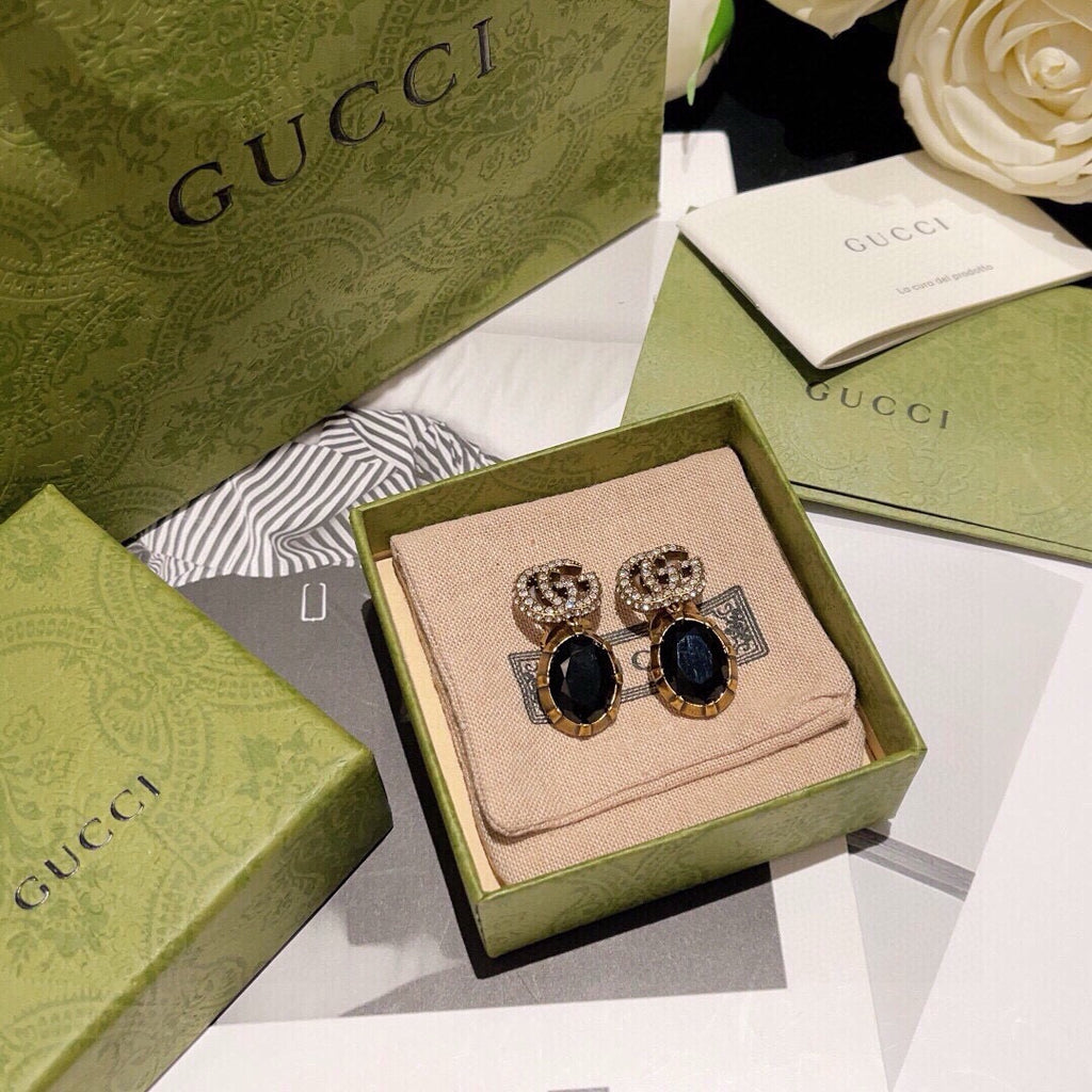 Gucci Interlocking G Antique Gold-Tone White Black GG Letter Earrings - album image 2