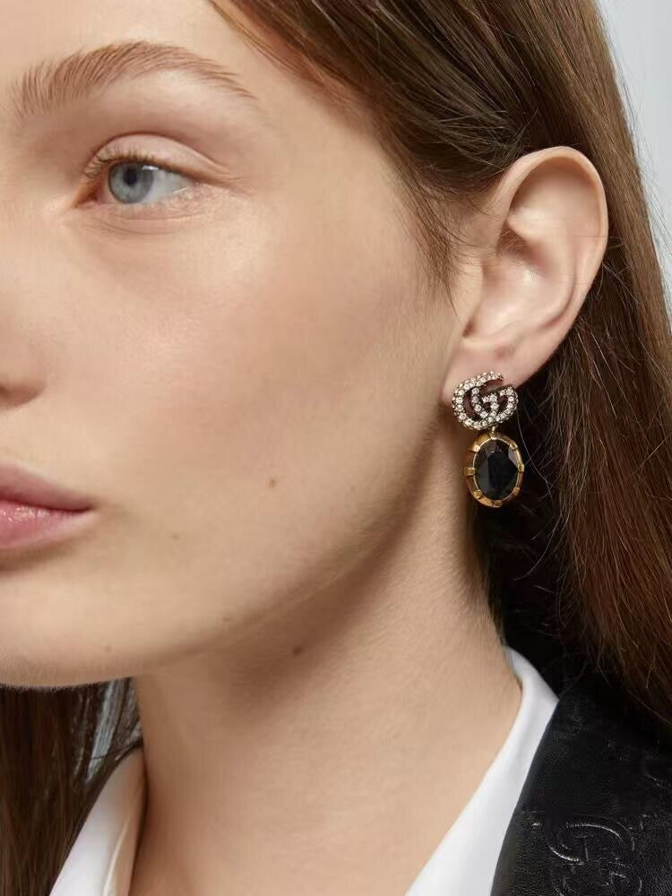 Gucci Interlocking G Antique Gold-Tone White Black GG Letter Earrings - album image 4