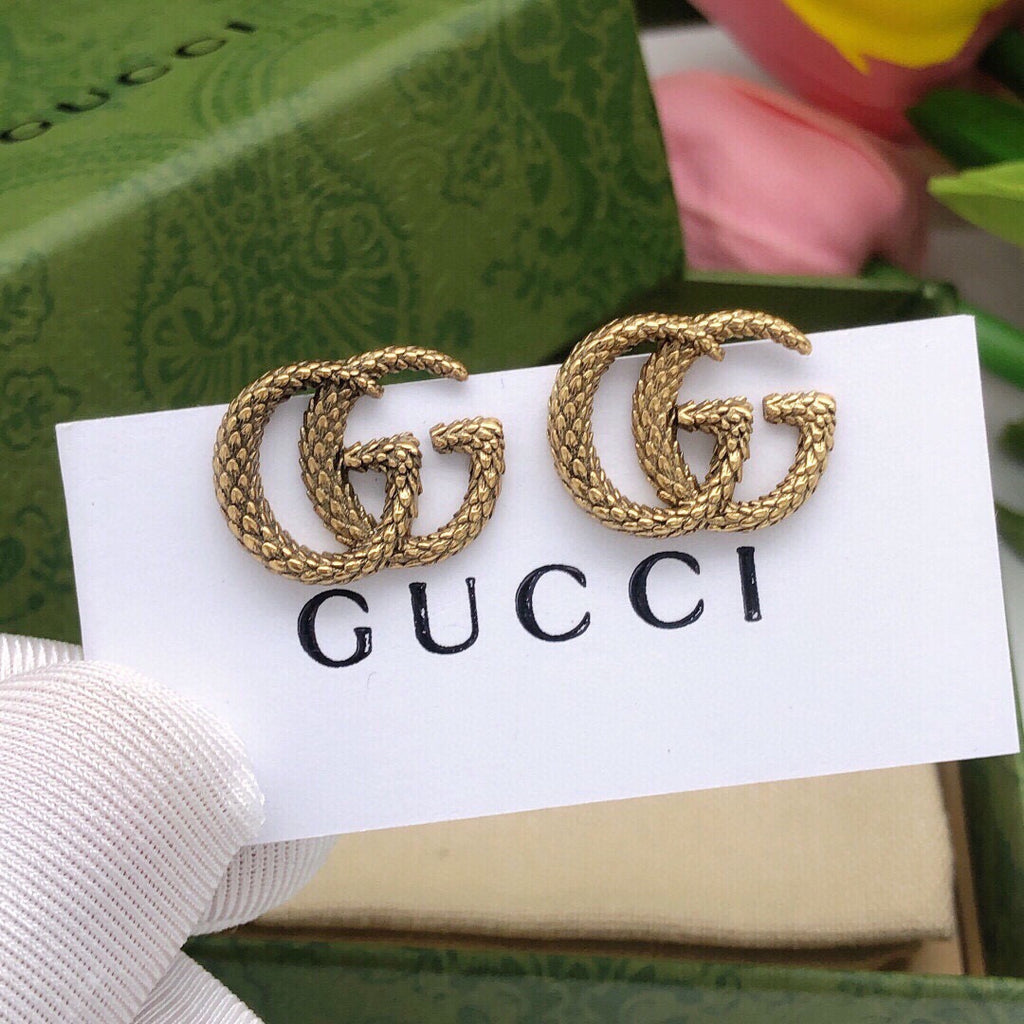 Gucci Snake Twisted Earrings - album image 1