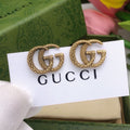Gucci Snake Twisted Earrings - album image 1