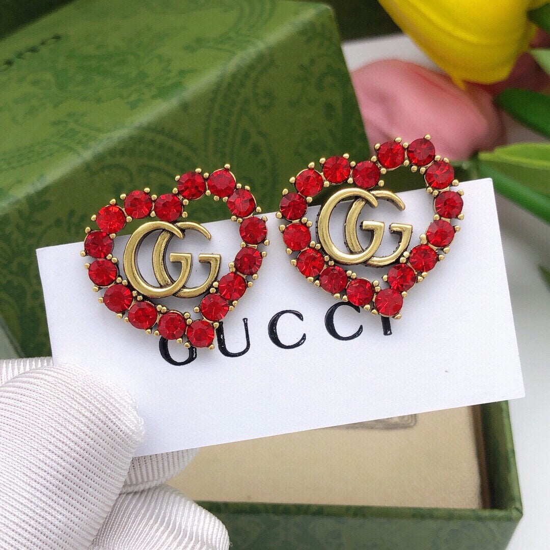 Gucci Interlocking G Heart Earrings - album image 1