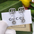 Gucci Interlocking G Star Earrings - album image 1