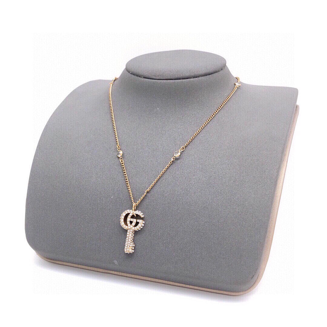 Gucci Interlocking G Key Crystal Accent Necklace - album image 1