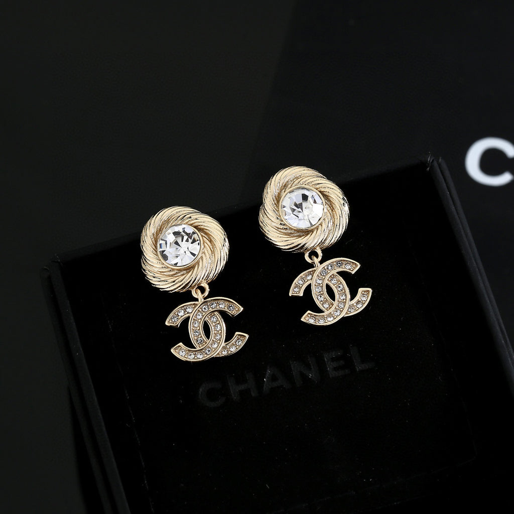 Chanel Interlocking C Gold-Tone Stud Earrings - album image 1