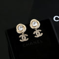 Chanel Interlocking C Gold-Tone Stud Earrings - album image 1
