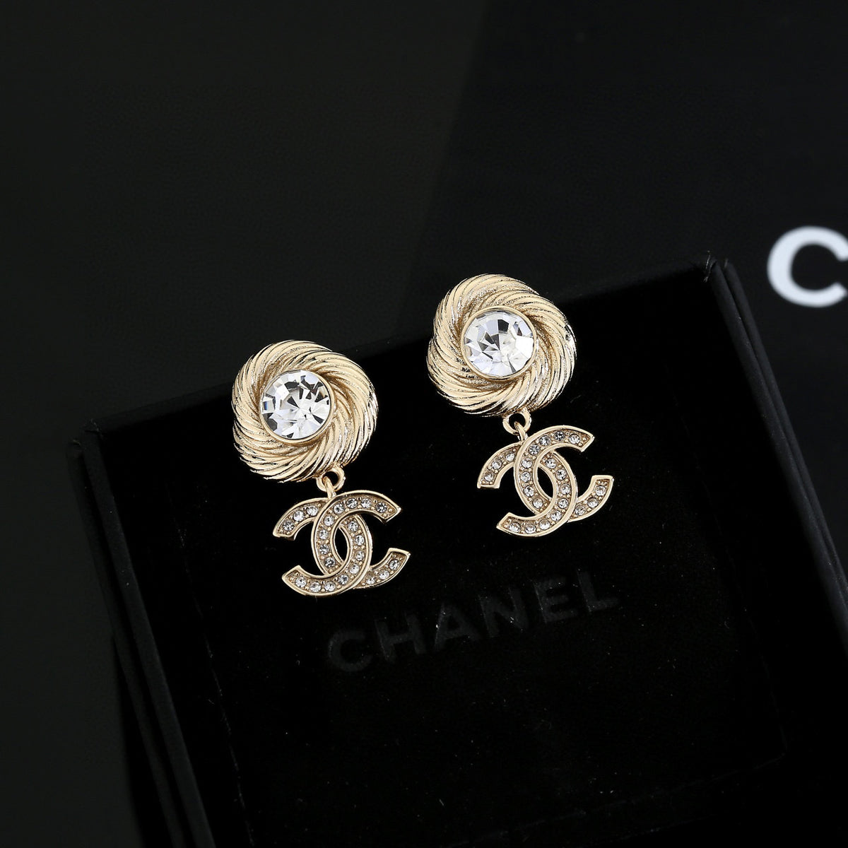 Chanel Interlocking C Gold-Tone Stud Earrings - album image 1
