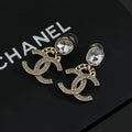 Chanel Interlocking C Resin Gold-Tone Stud Earrings - album image 1