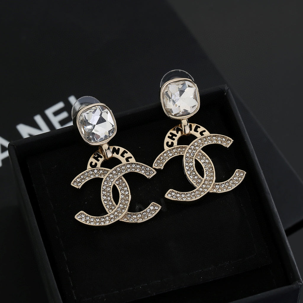 Chanel Interlocking C Resin Gold-Tone Stud Earrings - album image 2