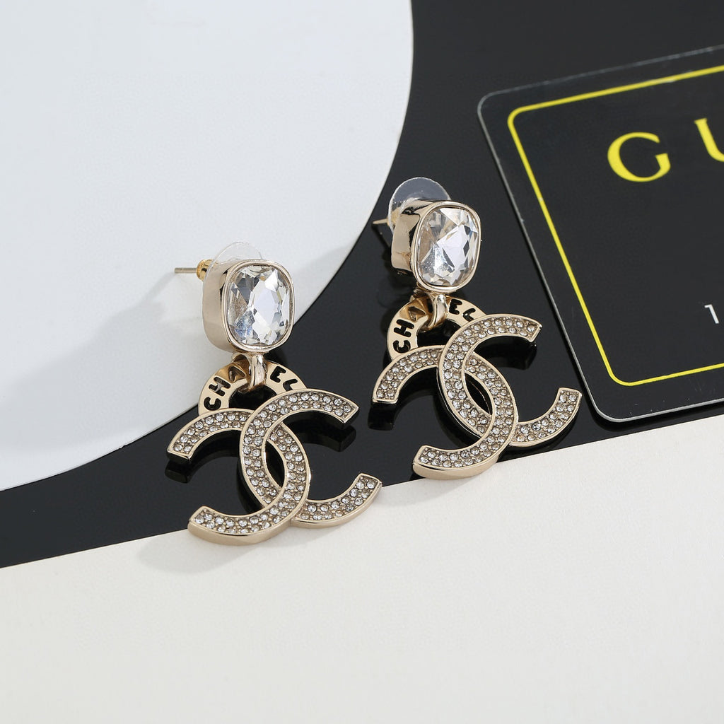 Chanel Interlocking C Resin Gold-Tone Stud Earrings - album image 3