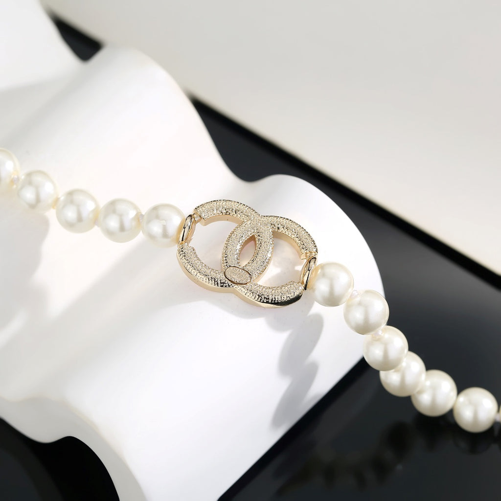 Chanel Interlocking C Pearl Necklace - album image 7