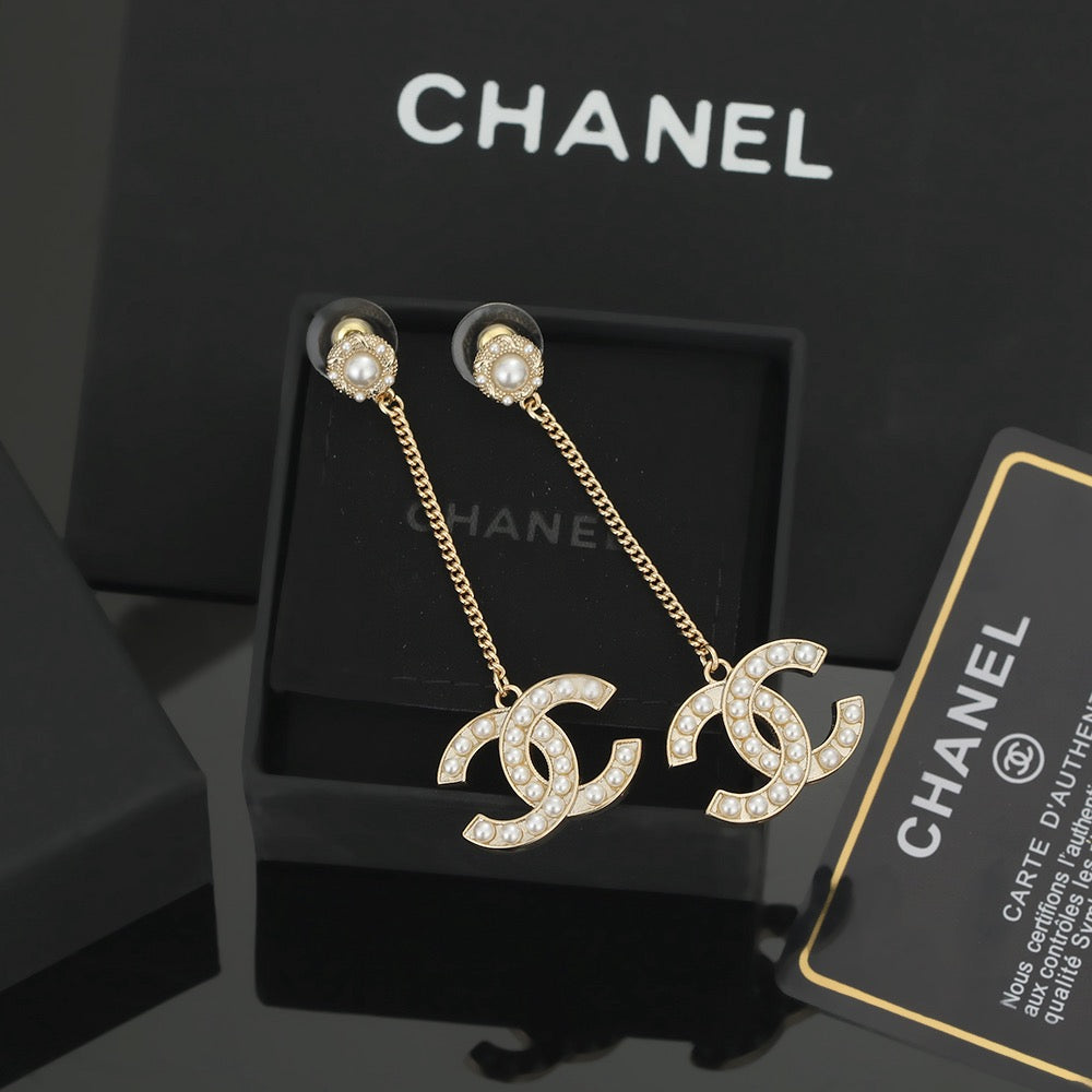 Chanel Interlocking C Pearl Earrings - album image 1