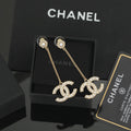 Chanel Interlocking C Pearl Earrings - album image 1