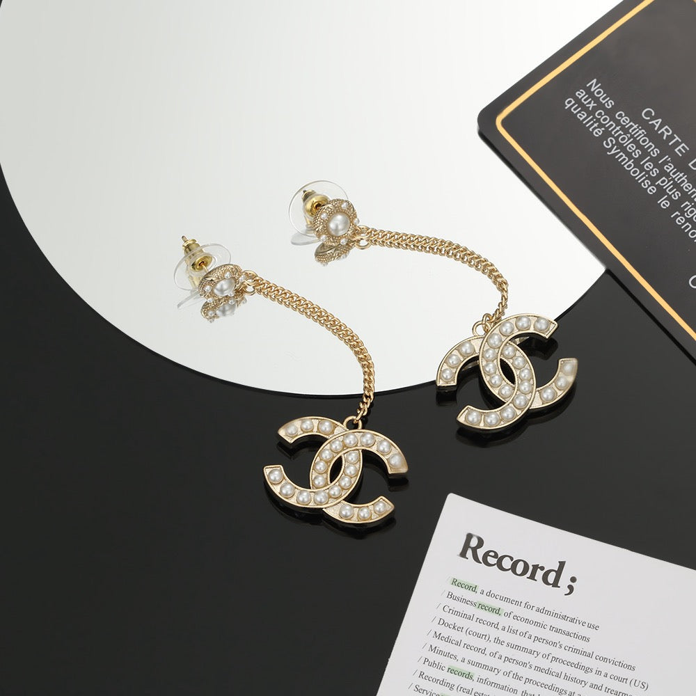 Chanel Interlocking C Pearl Earrings - album image 3