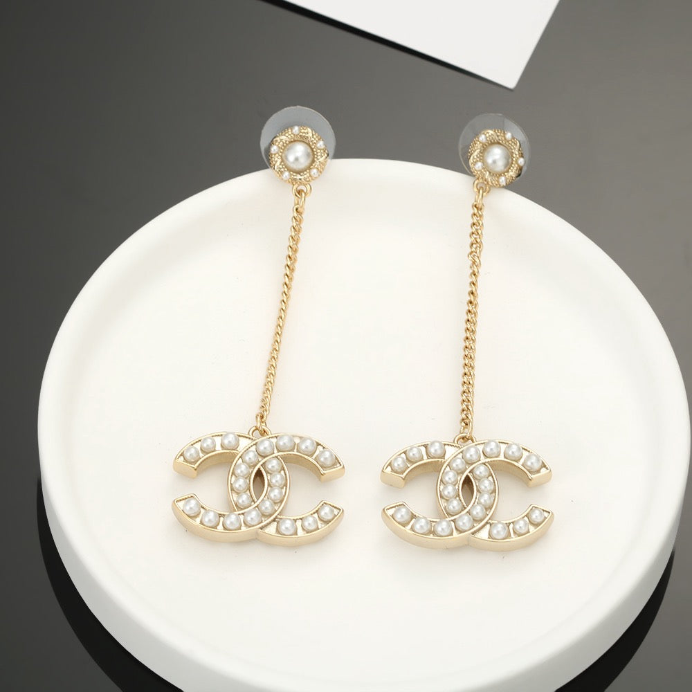 Chanel Interlocking C Pearl Earrings - album image 2