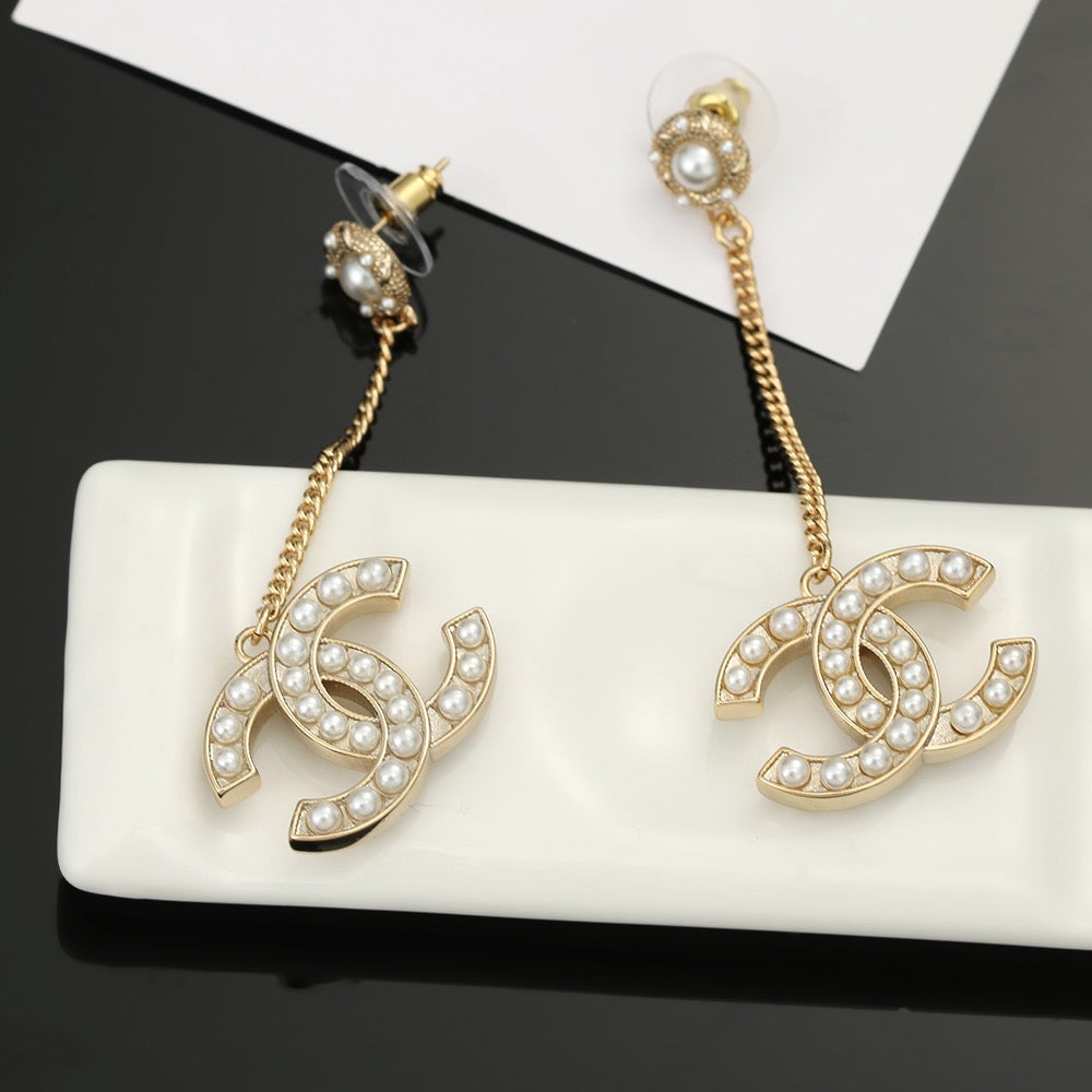 Chanel Interlocking C Pearl Earrings - album image 7