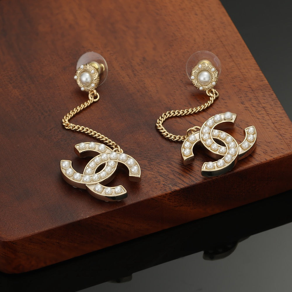 Chanel Interlocking C Pearl Earrings - album image 6
