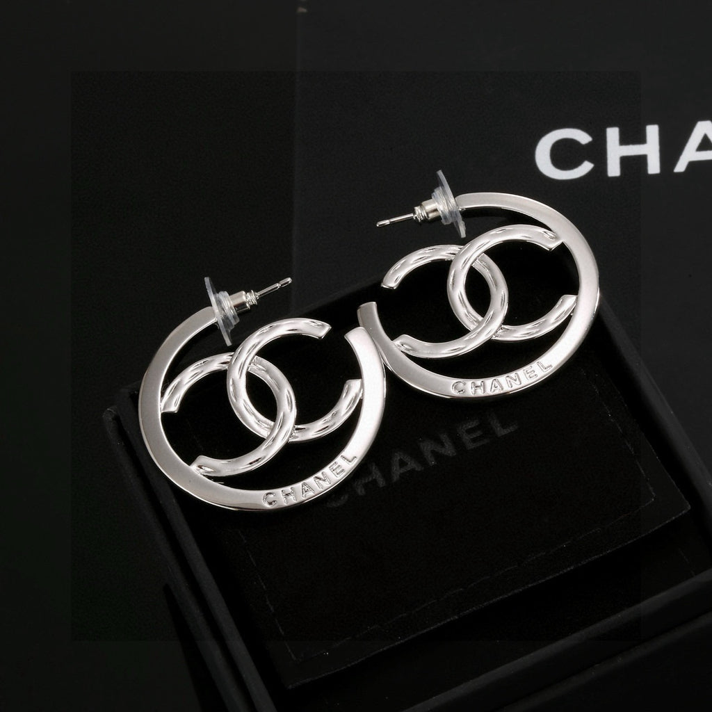 Chanel Letter Earrings - album image 1